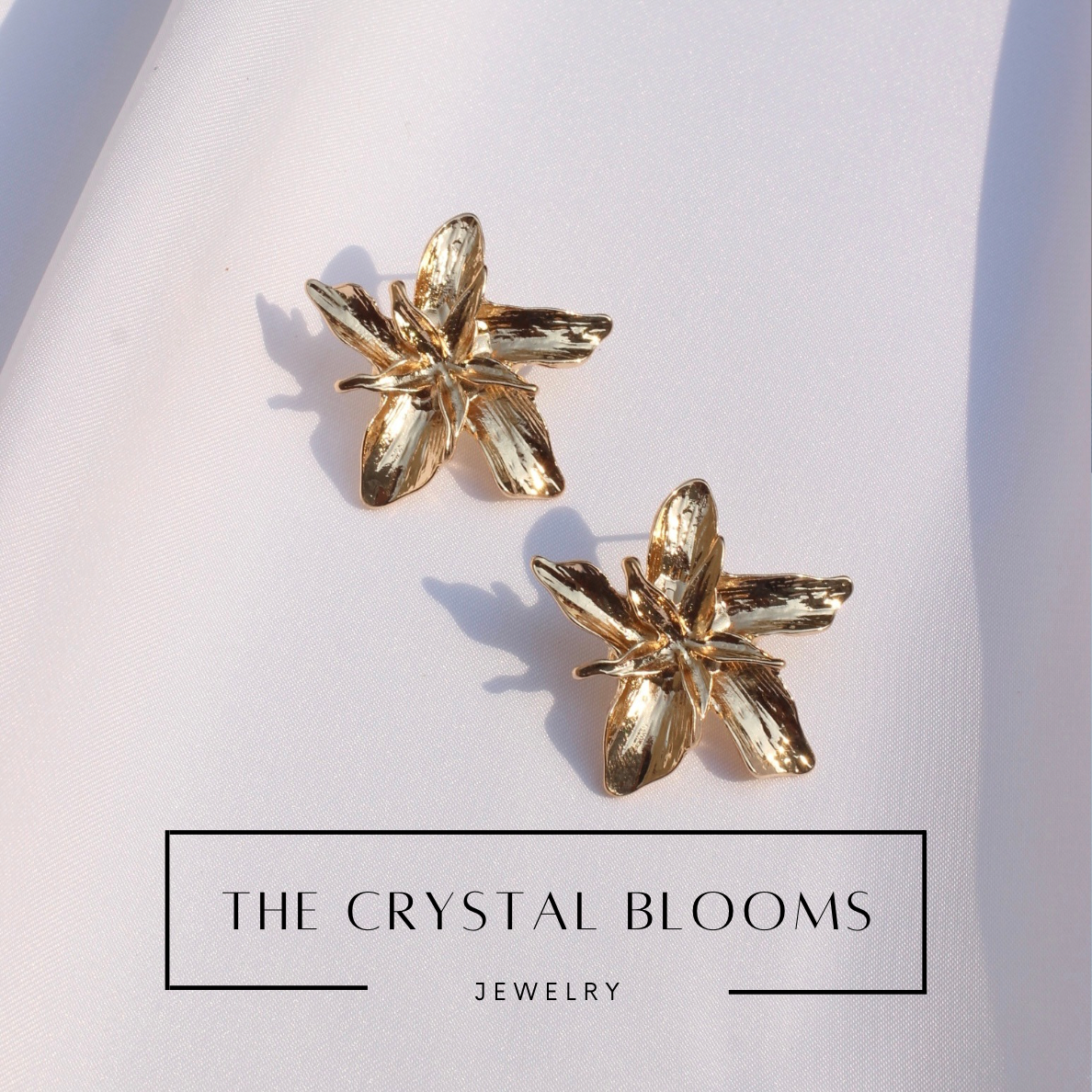 JEarrings gold statements flower studs-26